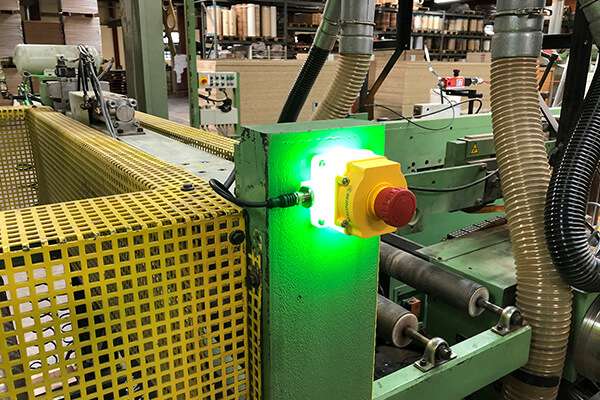 Luminous emergency stop on a laminating line Luminous emergency stop on a laminating line